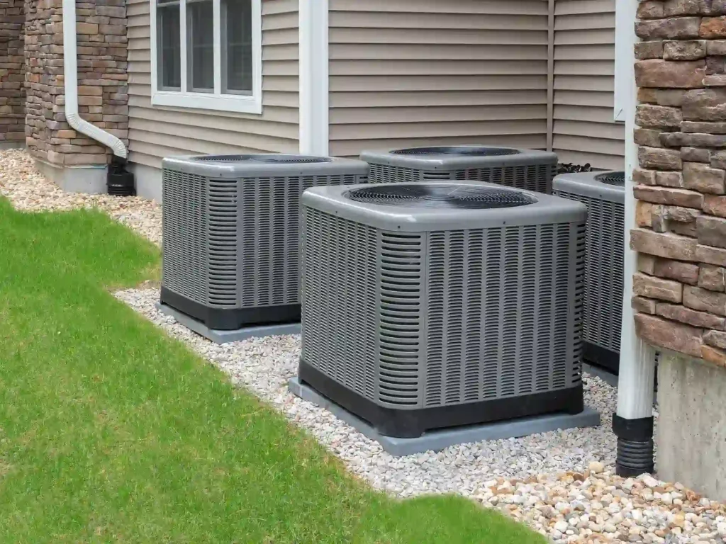 AC condenser units installed outside a home