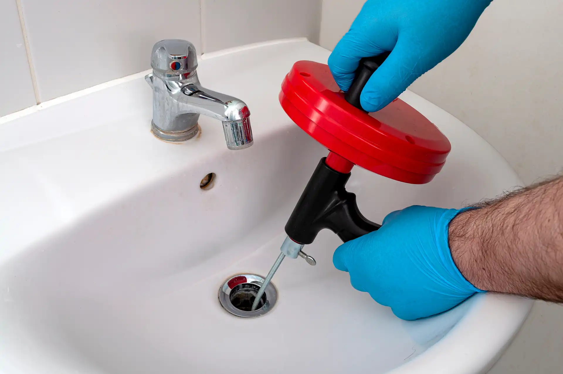 bathroom sink drain unclogging