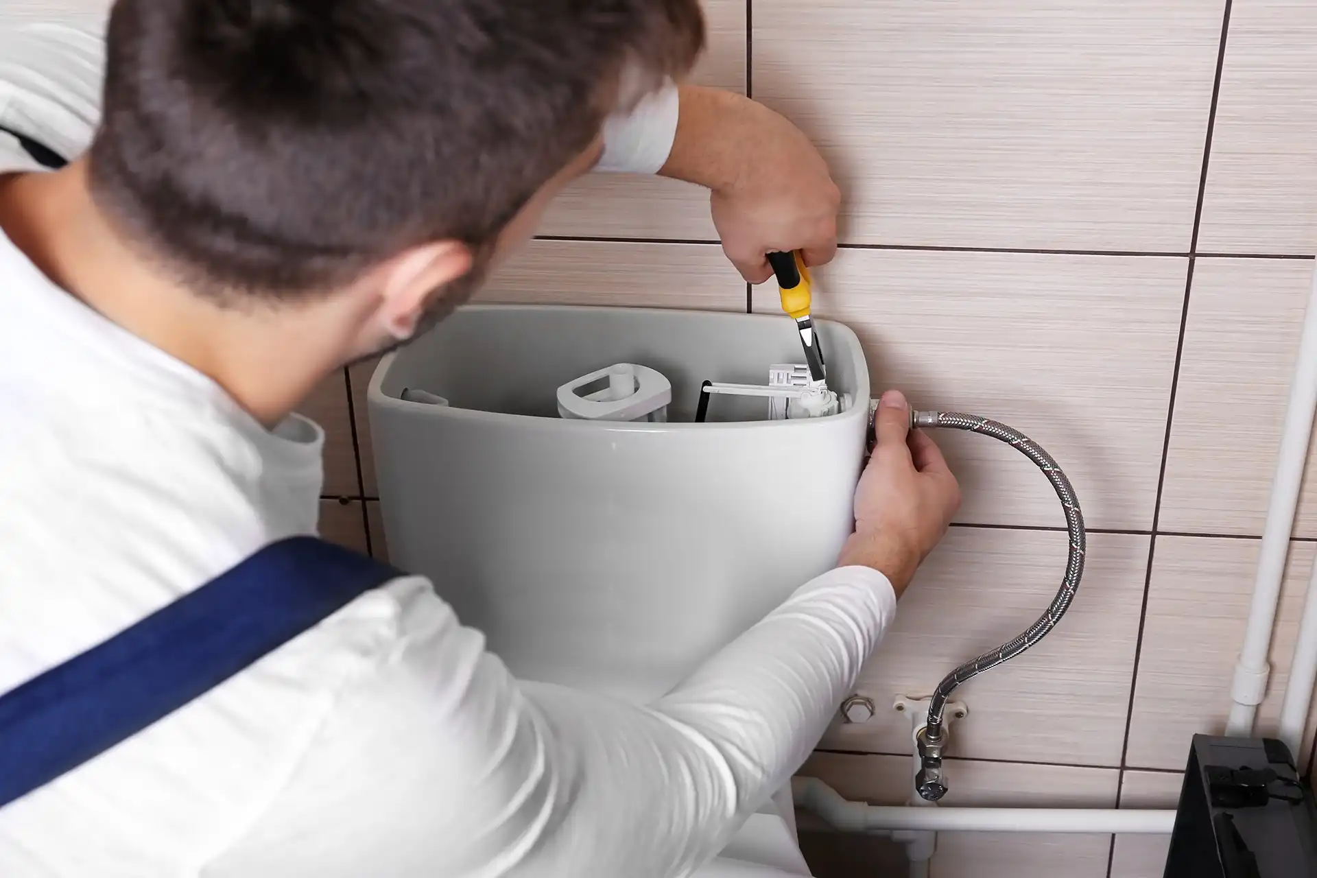 plumbing repair on toilet